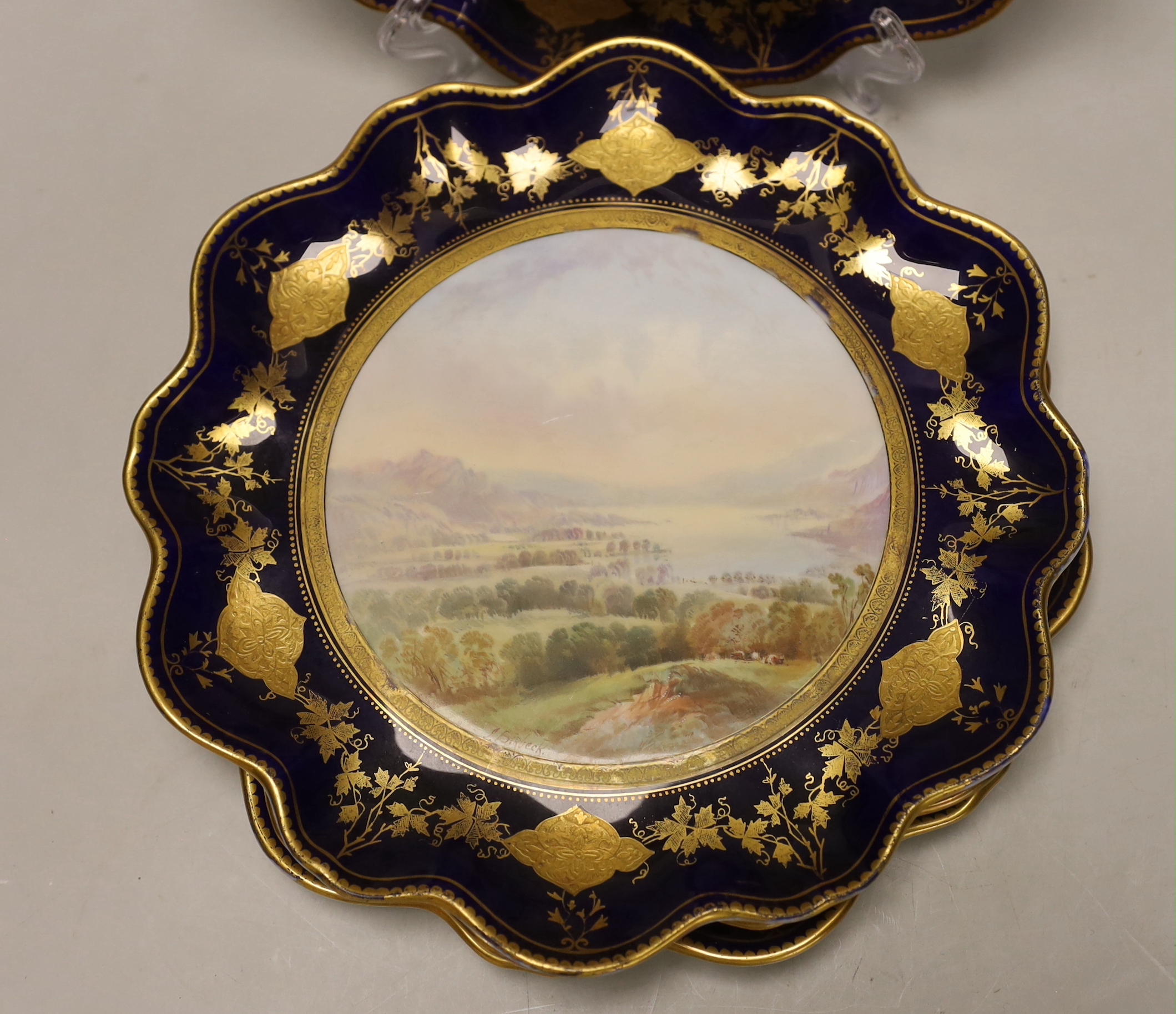 A set of four Victorian bone china cabinet plates, each painted with a named view by J Birbeck